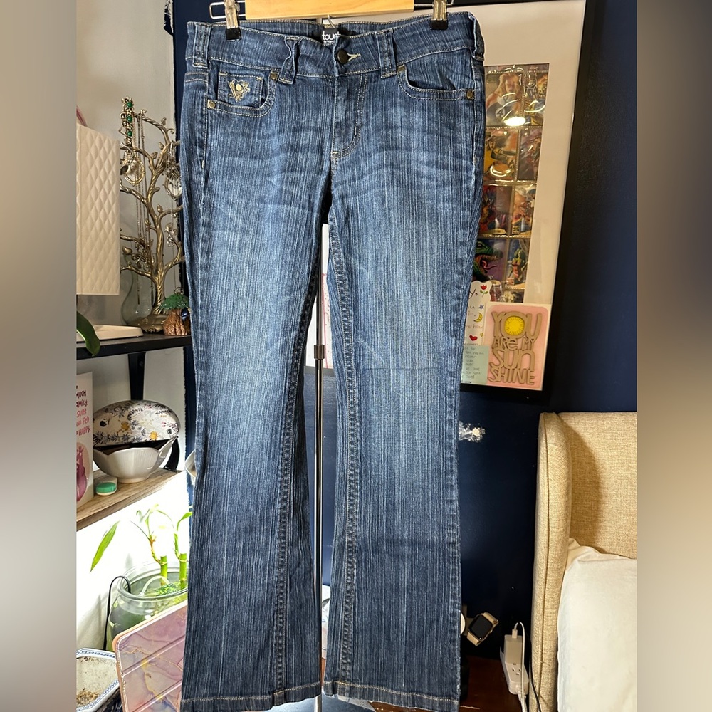 Alyssa Milano Touch Pittsburgh penguin jeans.